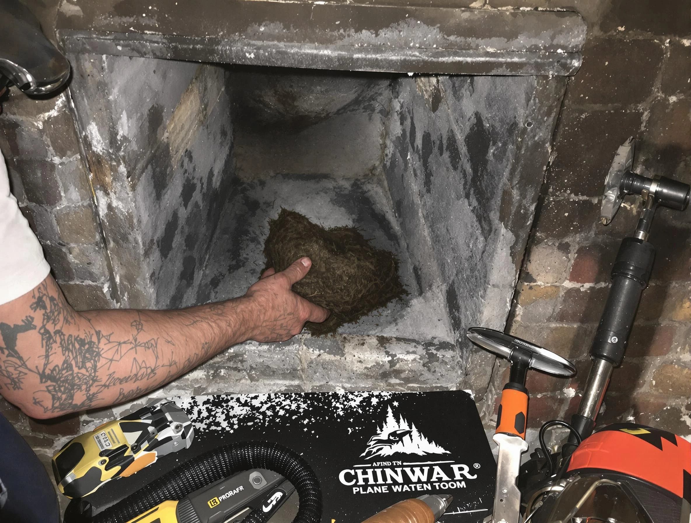 Hiram Chimney Sweep safely removing debris and screening chimney in Hiram, GA